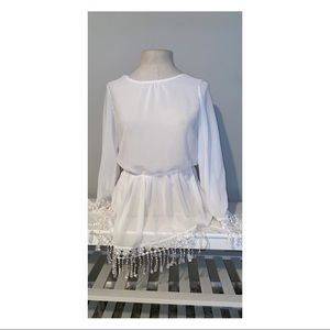 Woman’s Sheer Fringe Blouse